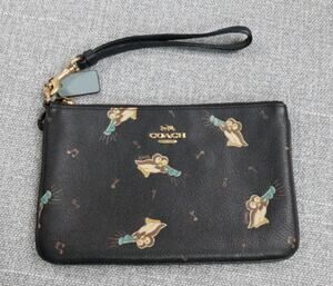 Coach Corner Zip wristlet with penquins